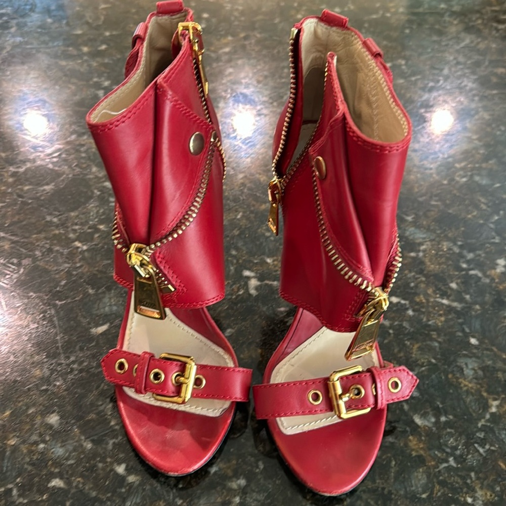 Gently used Red Moshine leather zipper heels